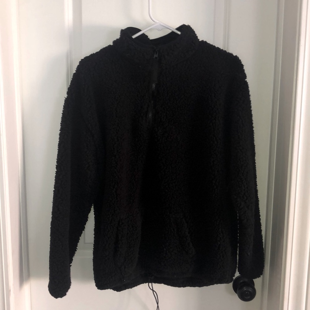 quarter zip sherpa with adjustable strap at bottom